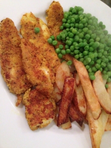 fish fingers with homemade chips and peas